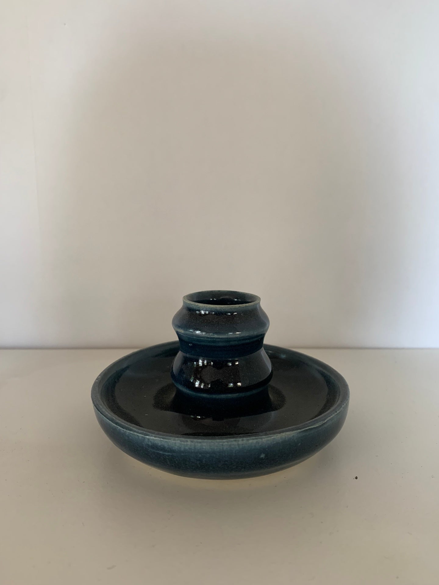 Navy tapered candle holder